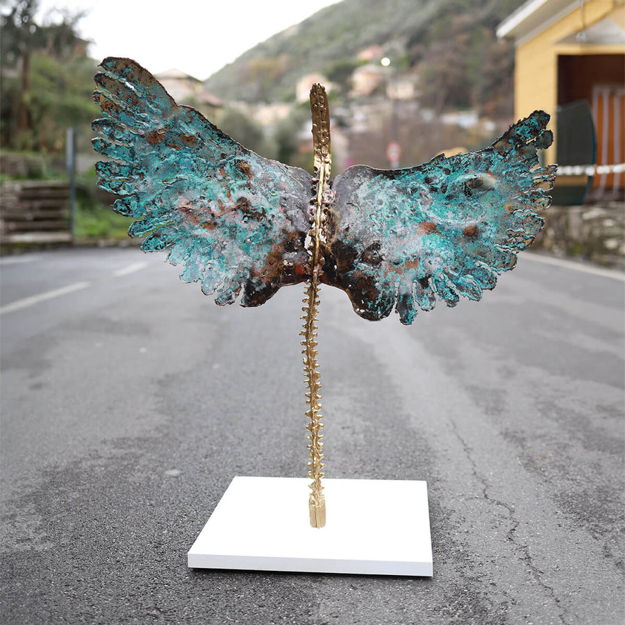 Angel - Non-anthropomorphic brass angel on wooden base by Razeto Giangi - Fp Art Online