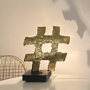 Hashtag - Backlit brass sculpture on wooden base by Razeto Giangi - Fp Art Online