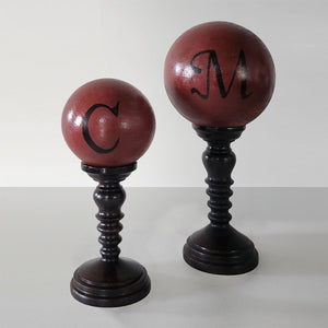 Red Spheres On Pedestal