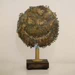 Trippy - Tortured brass emoticon on wooden base by Razeto Giangi - Fp Art Online